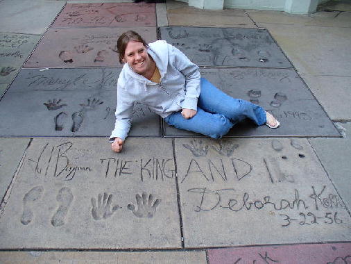 Mary lounging next to the squre of her relative.