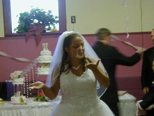 Cristyn enjoys the cake.