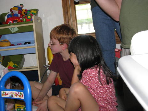 Charles and Eileen watch Anna do her thing.