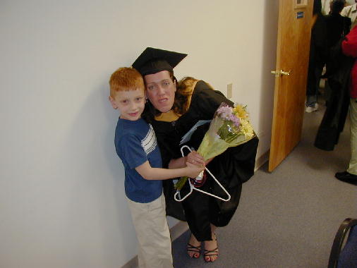 Charles gives flowers to Aunt Annie.