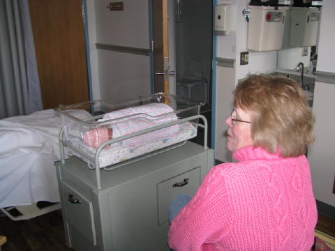 Grammie watches over her.