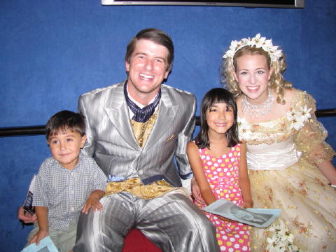 With Cinderella and the Prince.