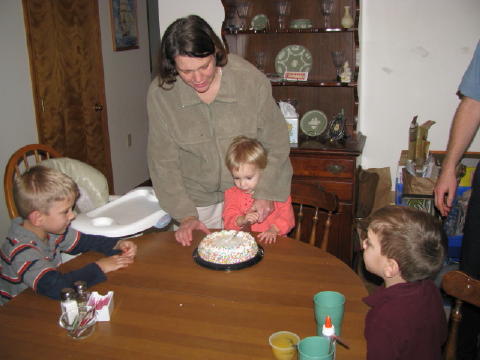 The traditional first slice.