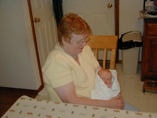 Grammie seems to be glowing with pride.