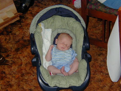 Michael relaxing in the car seat.