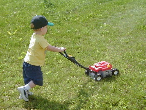 Michael mows the lawn at top speed.