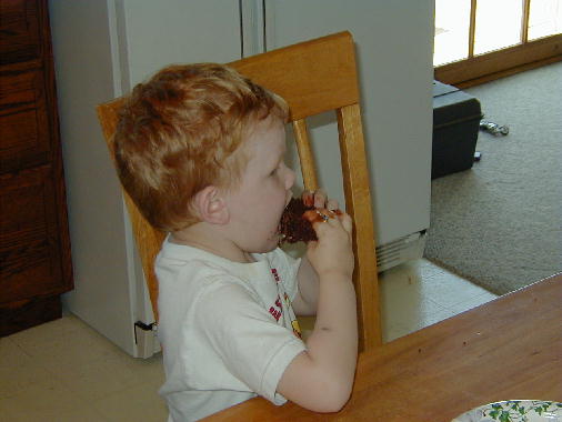Digging into some cake.