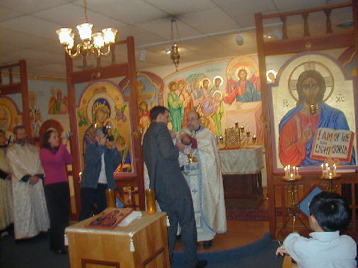 Michael receives the Eucharist for the first time.