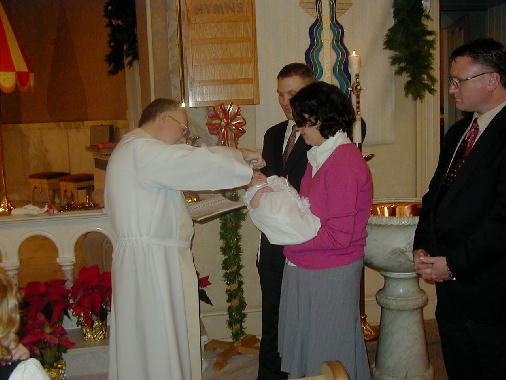 The anointing with chrism.