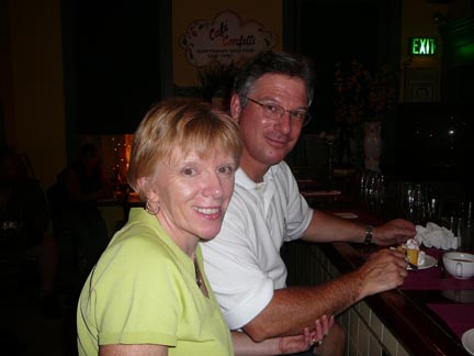 Mil and Chris relax at the bar.