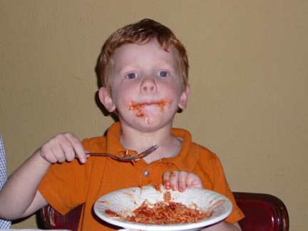 Michael enjoys his speghetti.