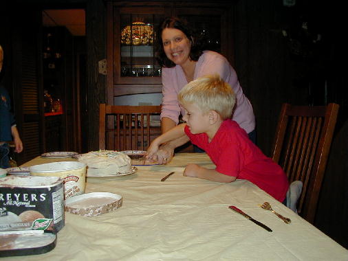 Cutting the cake.