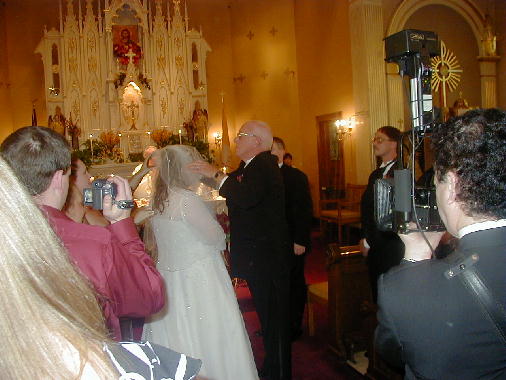 Michael removes the veil.
