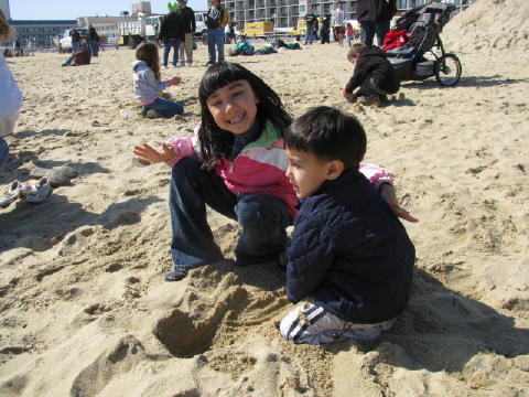 The kids enjoy the sand.