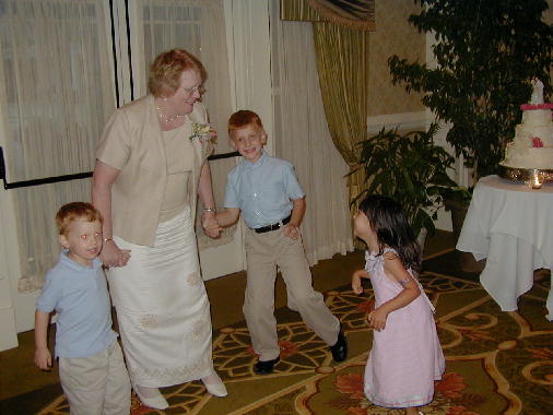 Grammie dances with the kids.