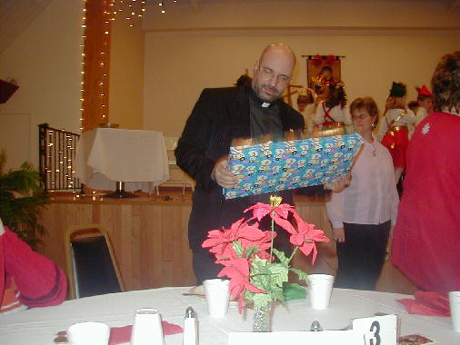 Father Ron receives a gift.