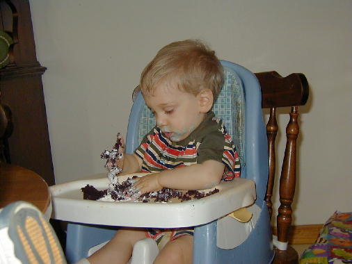 Getting the cake ready for the first bite.